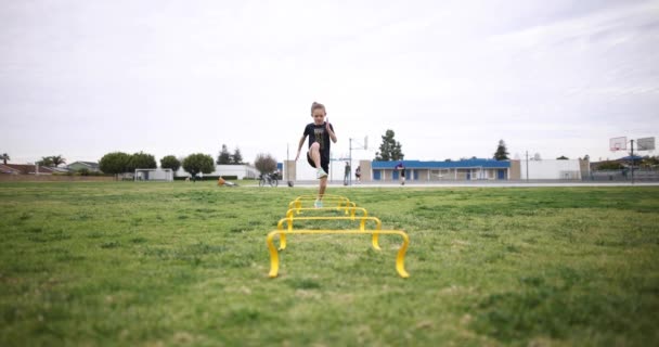 Young Athletic Girl Does High Knees Speed Hurdles Park Part — Stok video