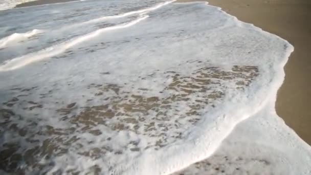 Pan Detail Some Waves White Foam Golden Sand Beach Summer — Vídeos de Stock