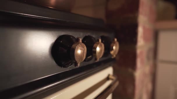 Close View Old Kitchen Fire Knobs Oven Light Reflections Shadows — Video
