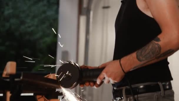 Tough Man Tattoos Using Grinding Tool Steel Creating Sparks — Video