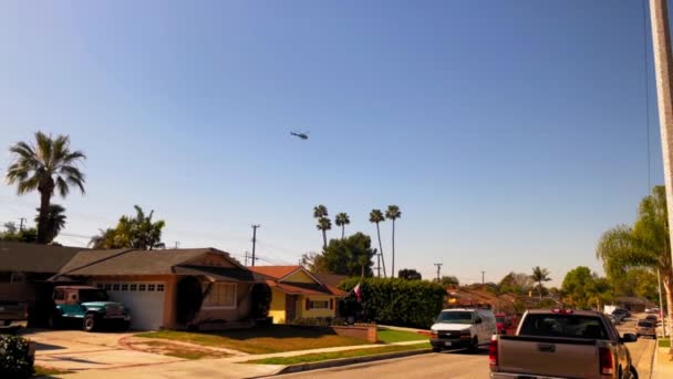 Helicopter Circling Some Houses Southern California Neighborhood — Stock Video