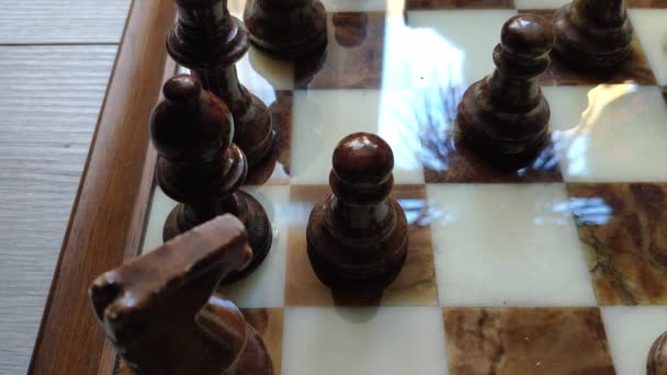 Marble Chess Game Bright Board Pieces Shine Reflections Pawn Moved — 비디오