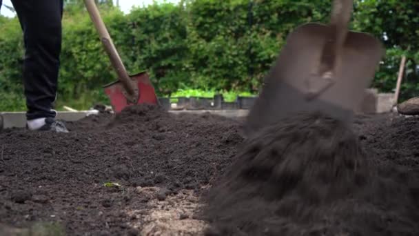 Workers Spreading Soil Compost Mix Garden Bed Ready Planting — Stockvideo