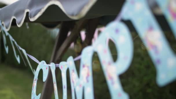 Blue Happy Bithday Letters Unicorns Hanging Garden Party Event Detail — Video Stock