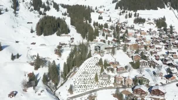 Tilt Snow Covered Swiss Town Mountains Background — Stockvideo