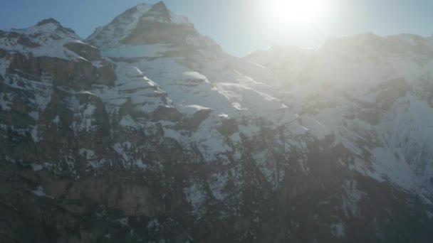Tilt Snow Covered Mountains Bright Sun Clear Blue Sky — Stockvideo