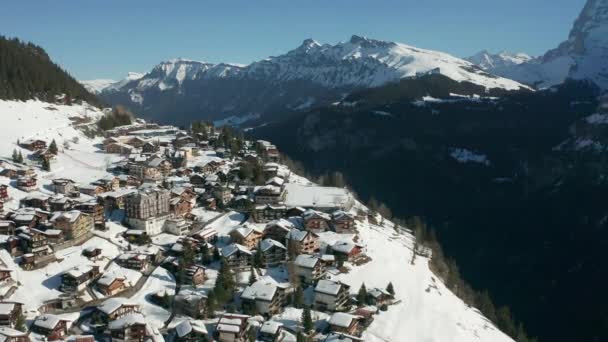 Stunning Aerial Snow Covered Swiss Town Edge Mountain — Stock video