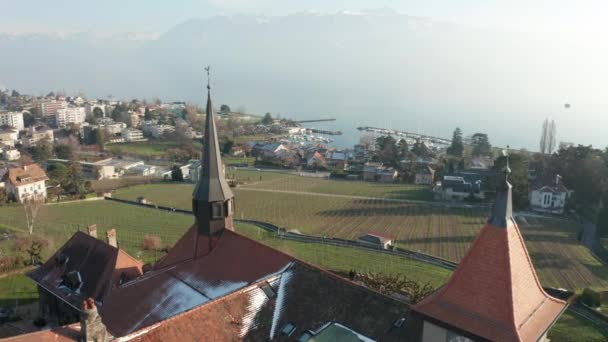 Flying Church Tower Overlooking Green Field — Stok video