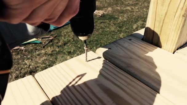 Man Using Drill Screw Screw Slow Motion Man Building Playset — Stock Video