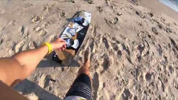 Pov Man Picks Kitesurfing Board Sand Runs Water Jump Sunny — Stok Video