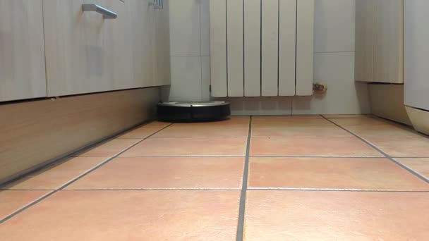 Hoovering Robot Going Kitchen Floor Made Tiles Hits Corner Turns — Stockvideo