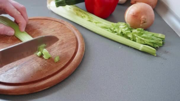 Slow Motion Chopping Celeriac Small Pieces — Vídeos de Stock