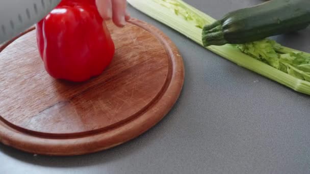Cutting Half Red Bell Pepper — Videoclip de stoc