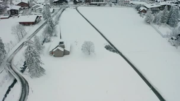 Aerial Beautiful Small Church Covered Snow — Stockvideo