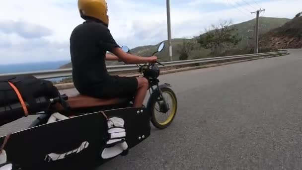 Man Rides Motorbike Transporting Surfboard Kitesurfing Equipment — Vídeo de Stock