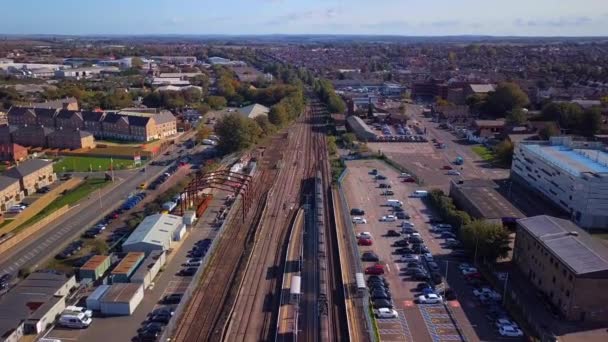 Drone Shot Train Leaving Sittingbourne Station Flying Forwards Panning — Stok Video