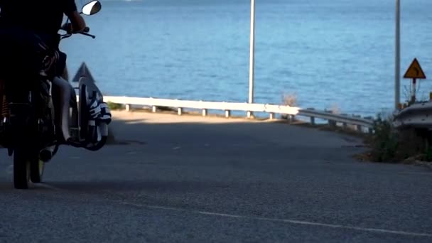 Man Rides Motorbike Surfboard Rack Seaside Road Kiteboarding Trip — ストック動画
