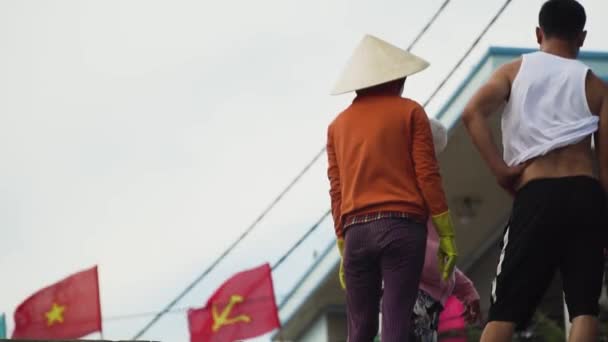 Back View Vietnamese People Standing Waving Communist Vietnam Flags Background — ストック動画