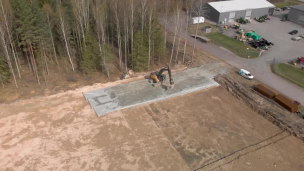 Aerial Footage Drone Pushing Away Excavator Working Site — Stok video