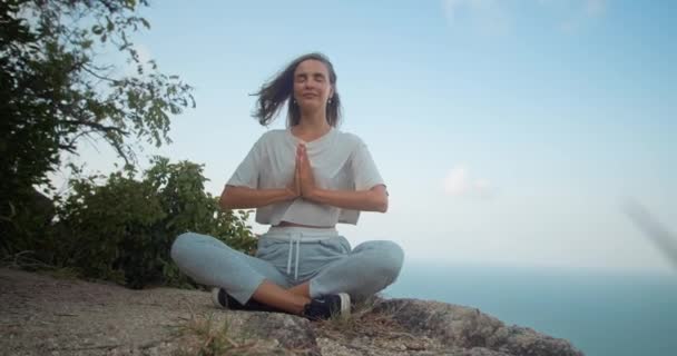 Happy Healthy Girl Folding Palms Sitting Mountain Rock Sea View — Stockvideo