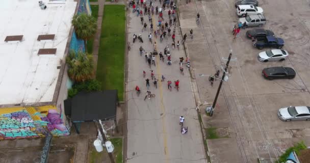 Birds Eye View Bicyclists Riding Streets — Stockvideo