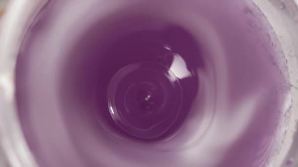 Making Fresh Purple Juicy Drink Top View Working Blender — Stock video