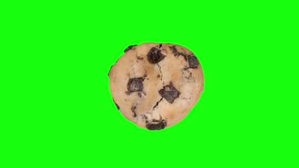 Chocolate Chip Cookie Spinning Green Background Close Overhead Shot — Stock Video