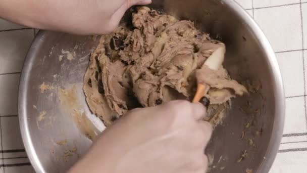 Person Mixing Cookie Dough Using Spatula Stainless Bowl Topdown Shot — 图库视频影像