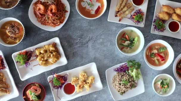 Male Hand Placing Center Dish Flat Lay Thai Cuisine Arrangement — Video