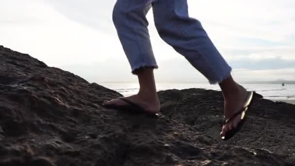 Woman Walking Coastal Rocks Beach Tracking Shot — Wideo stockowe