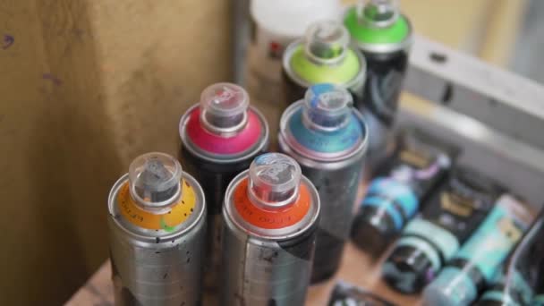 Colorful Spray Painting Bottles Graffiti Street Art Concept Top View — Stok video