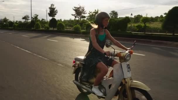 Young Caucasian Woman Long Blond Hair Cautiously Riding Vintage Style — 비디오