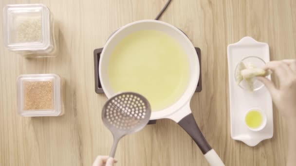 Cook Putting Food Boiling Oil White Pot Top View Static — ストック動画