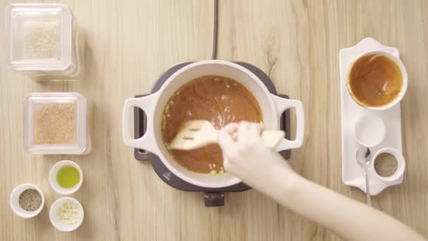 Chef Mixing Red Soup Garlic Boiling Pot Top View Static — 图库视频影像