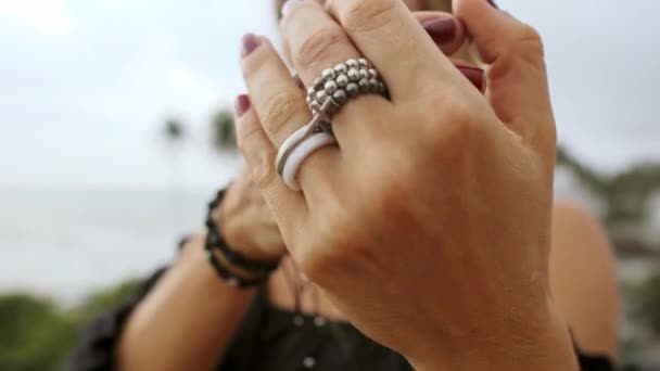 Woman Enjoying Ocean View While Modeling Jewelry — 图库视频影像