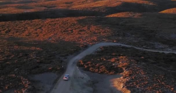 Solitary Car Drives Denniston Plateau New Zealand Camera Tilts Car — Vídeo de Stock