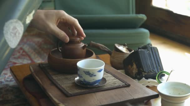 Water Being Poured Thermos Clay Teapot Tea Table Next Other — Stock videók