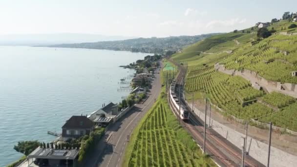 Aerial Train Driving Beautiful Swiss Landscape Hills Large Lake — Video
