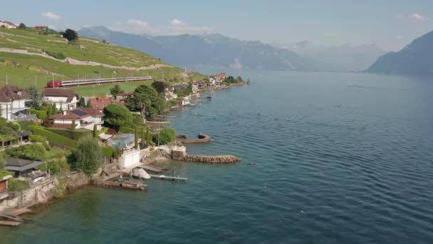 Aerial Train Driving Beautiful Swiss Coastline — Stockvideo