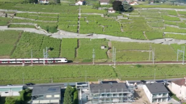 Aerial Train Driving Beautiful Swiss Landscape Panning Vast Beautiful Lake — Vídeos de Stock