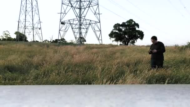 Male Drone Operator Inspecting Collecting Aircraft Launch Pad — Stock videók