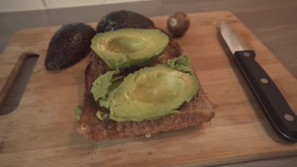 Whole Grain Toast Bread Topped Fresh Avocado Fruit High Angle — Videoclip de stoc