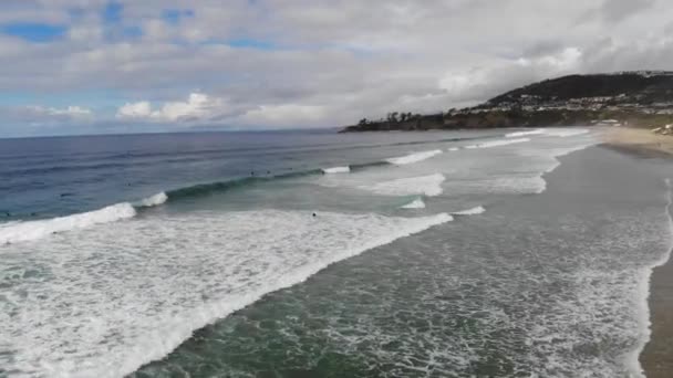 Drone Rotates Twists Crashing Waves Revealing Surfers Surfing Beach — Stock videók