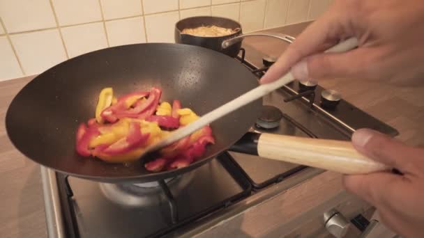 Stir Frying Red Yellow Sweet Peppers Wok High Angle — Stock video