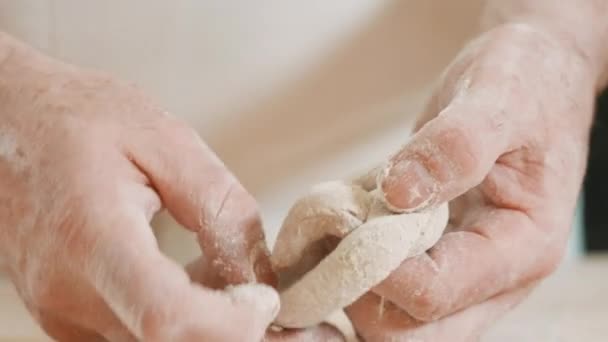 Hands Experienced European Baker Skillfully Shaping Knotted Bread Rolls Making — Video Stock