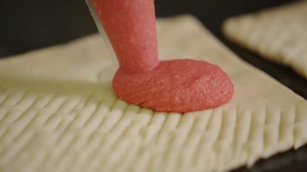 Squeezing Pink Strawberry Cream Frosting Piping Bag Pastry Pastry Dough — Stok video