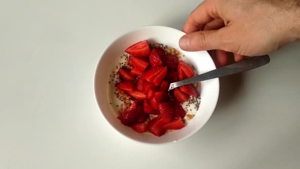 Big Bowl Yogurt Plenty Toppings Strawberries Cereal Left Table Stirred — Stockvideo