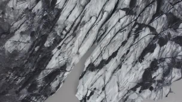 Aerial View Darkened Sooty Glacier Surface Iceland Overhead Drone Shot — Stockvideo