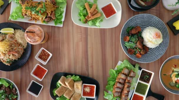 Male Hand Placing Thai Cuisine Fried Fish Flat Lay Food — Videoclip de stoc