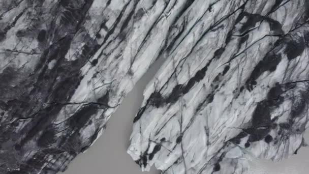 Aerial View Darkened Melting Glacier Surface Top Drone Shot — Stockvideo